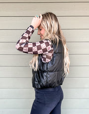 Faux leather puffer vest in Black