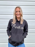 Black hoodie with 'RODEO' written in white rope on the front.