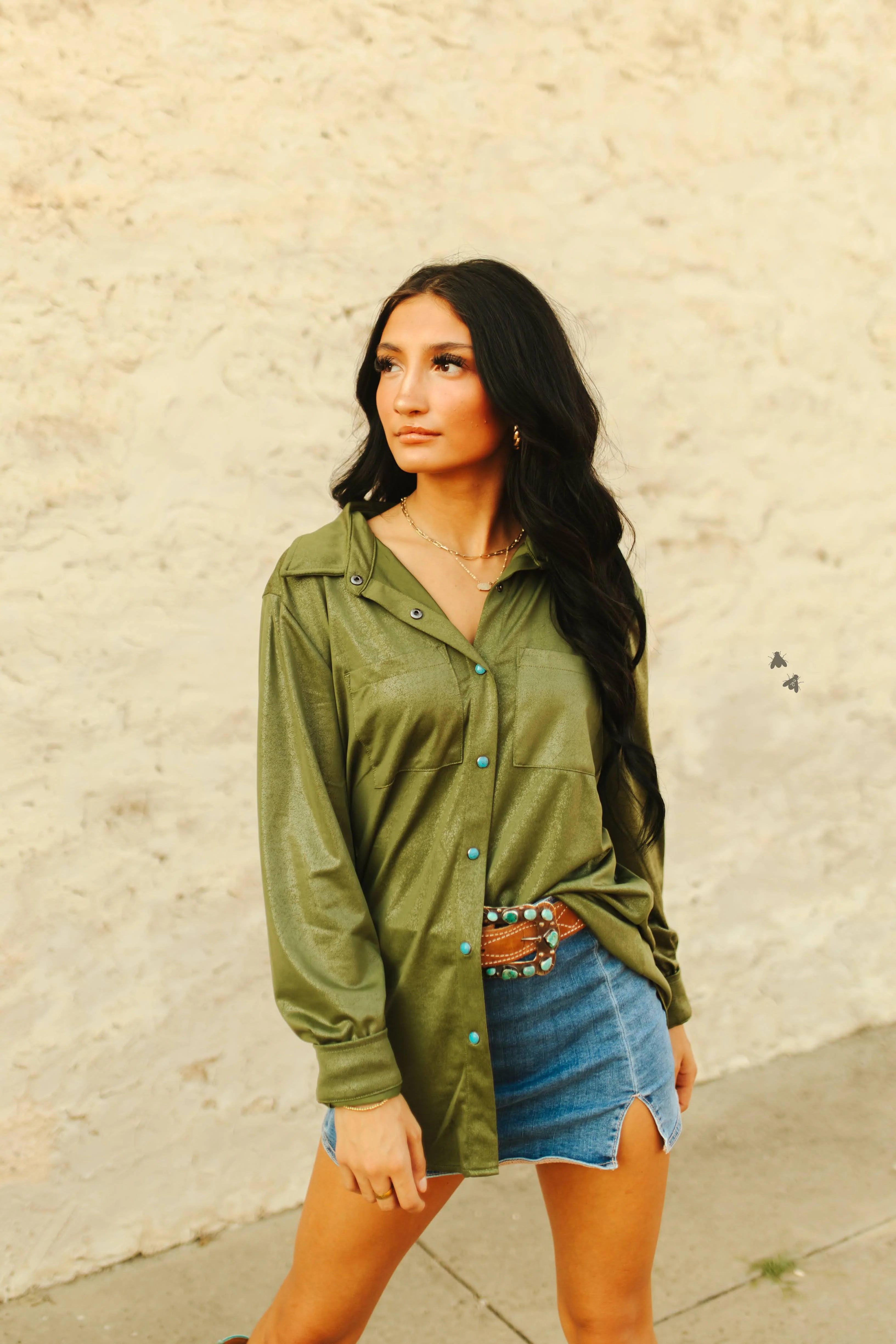 Green long sleeve button up shirt with turquoise pearl snaps