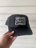 Black trucker hat with 'World's Okayest Cowgirl' text 