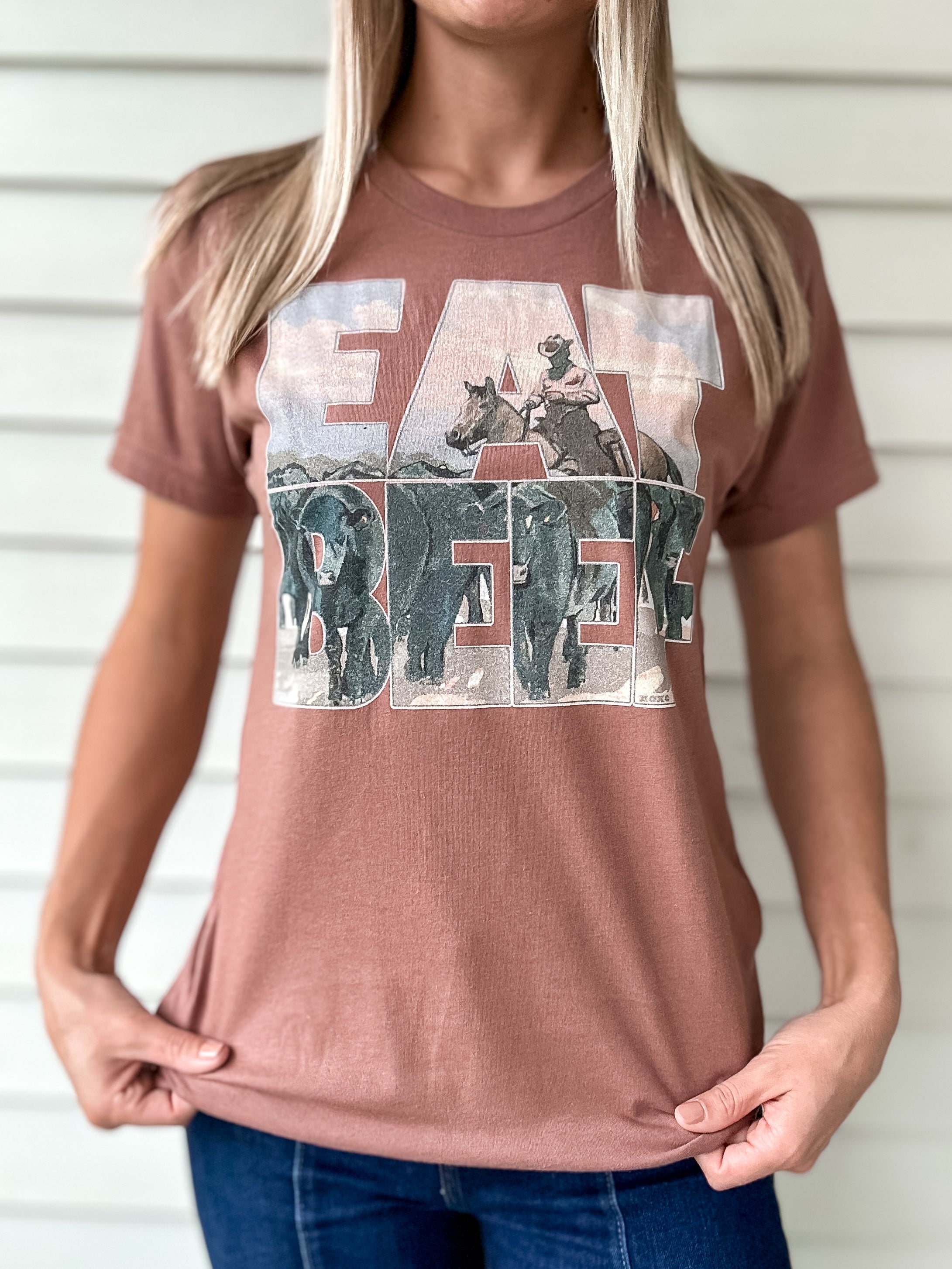 Clay colored t shirt with EAT BEEF text and cowboy graphic