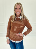Rust colored sweater with longhorn and aztec design