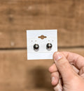 A pair of 10mm sterling silver pearl stud earrings 