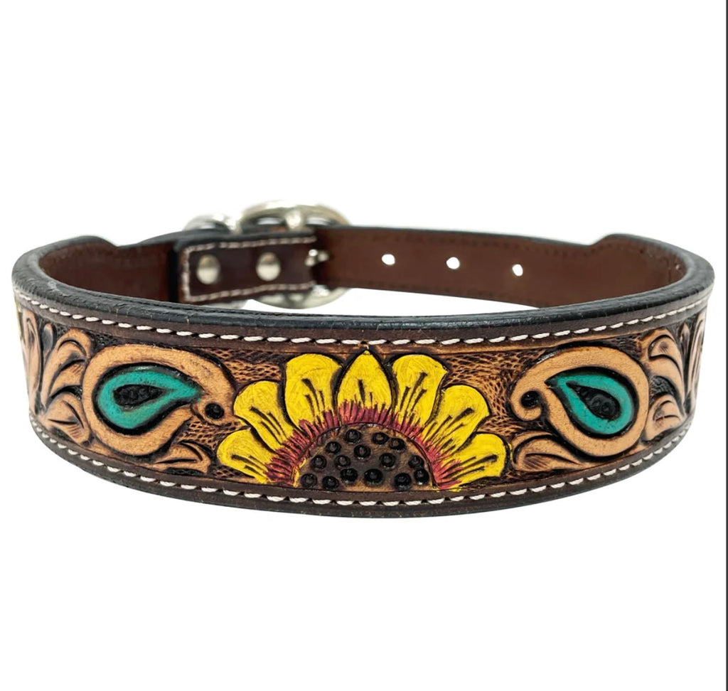 A brown leather dog collar with a floral pattern, featuring a metal buckle and hardware.