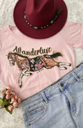 Light pink women’s tee shirt with a horse design that reads Wanderlust