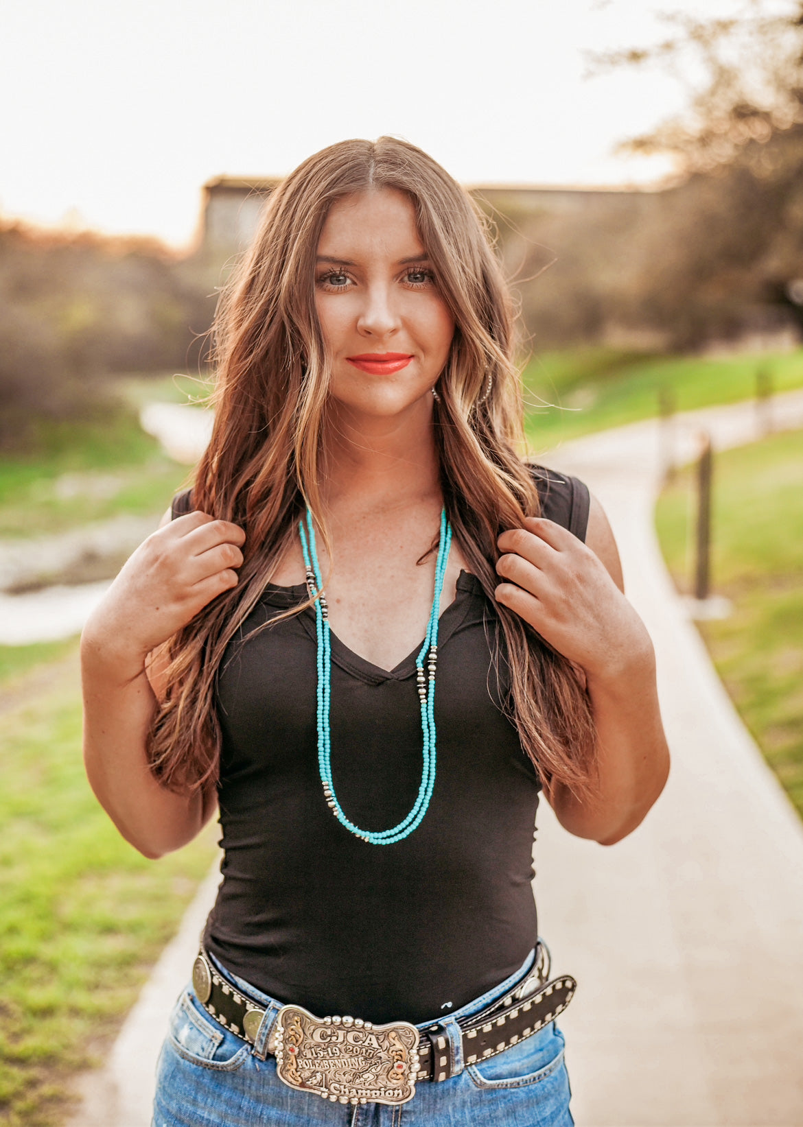 West & Co Long faux turquoise necklace with faux silver beaded accents