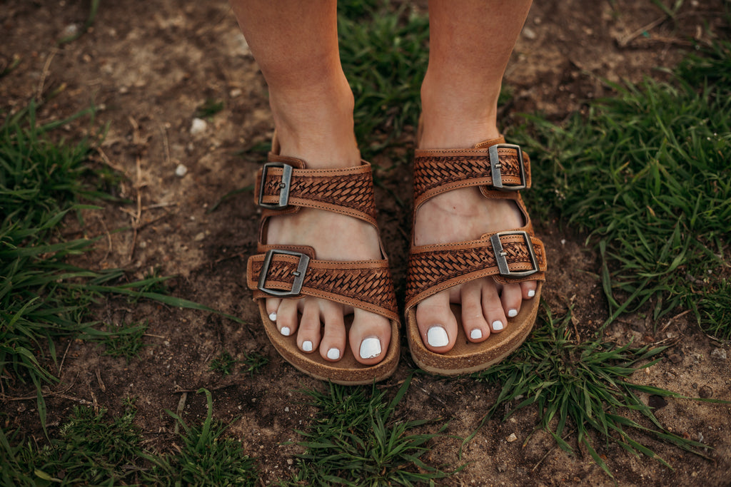 Brown tooled leather buckle sandals