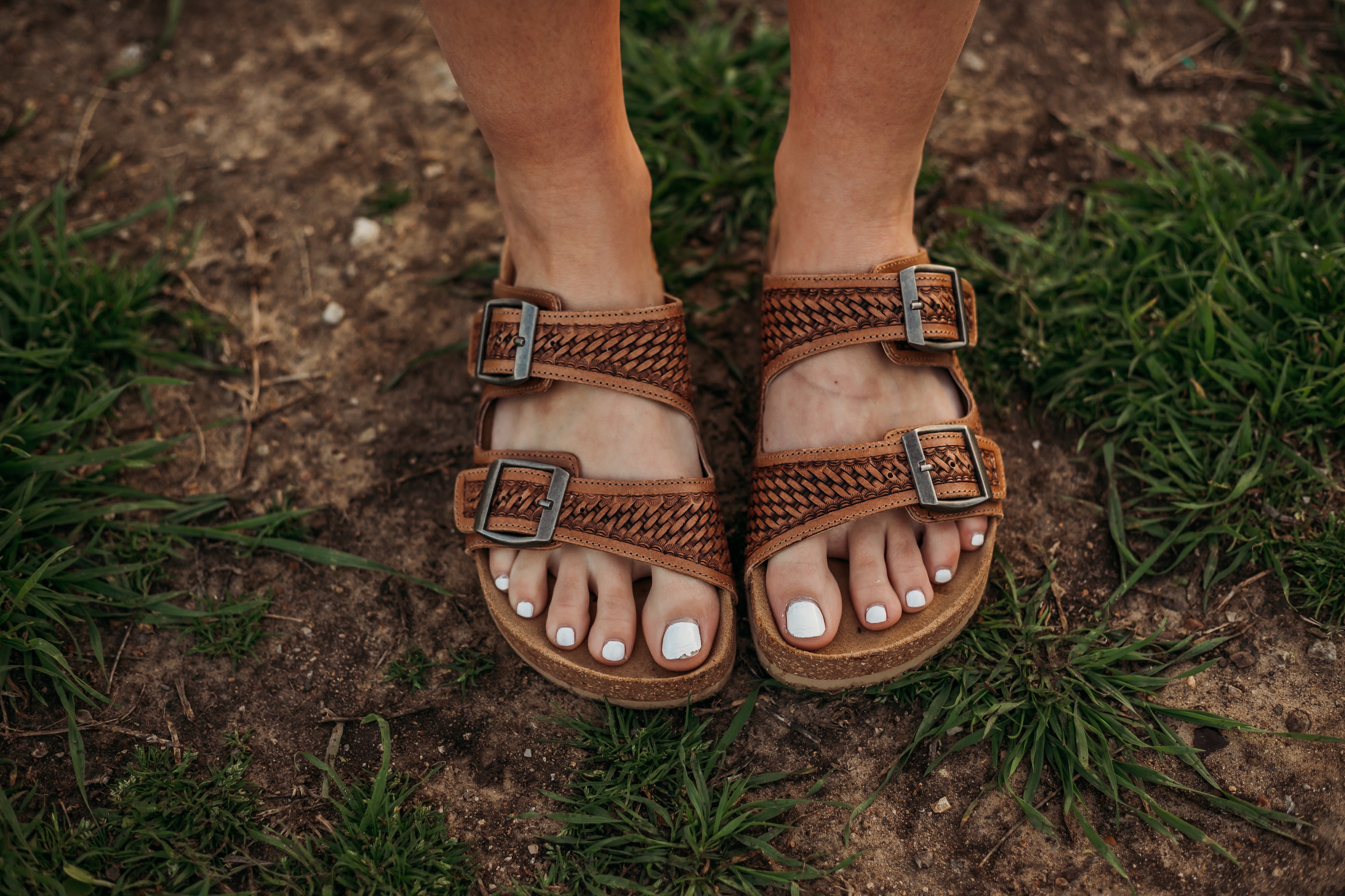 Brown tooled leather buckle sandals