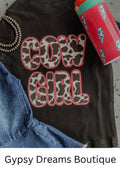 Black little girls tee with COWGIRL text in black and white cow print and pink border